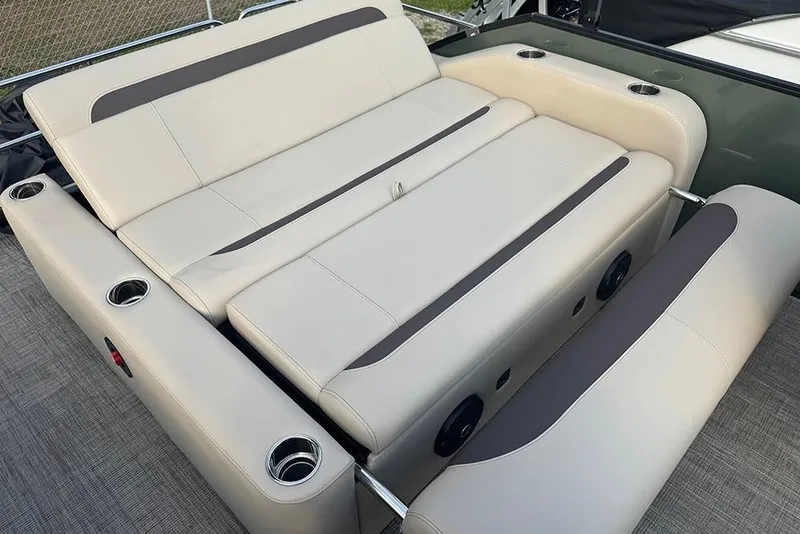 Slide: The Image of 2026 Bentley Pontoons Legacy 223 Swingback seating with cup holders and sleek design. - 29