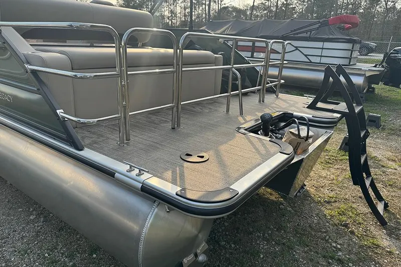 Slide: The Image of 2026 Bentley Pontoons Legacy 223 Swingback, rear view with seating and railing. - 35