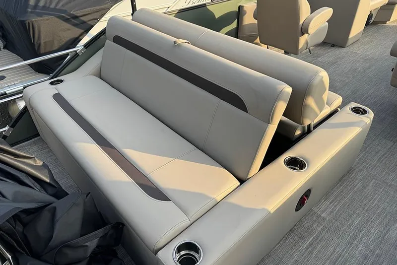 Slide: The Image of 2026 Bentley Pontoons Legacy 223 Swingback interior seating with cup holders. - 37