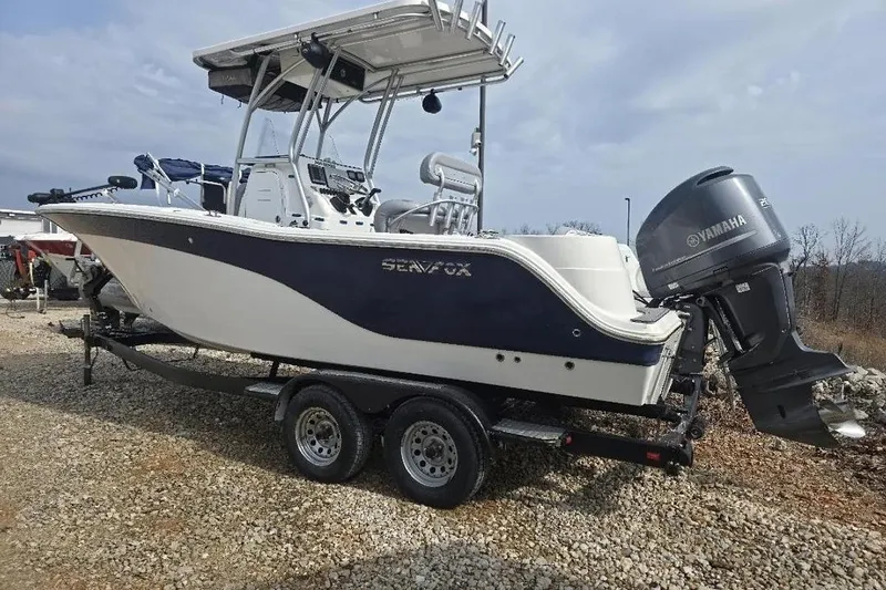 The Image of 2012 Sea Fox 226 Center Console boat on trailer with Yamaha outboard motor. - 0