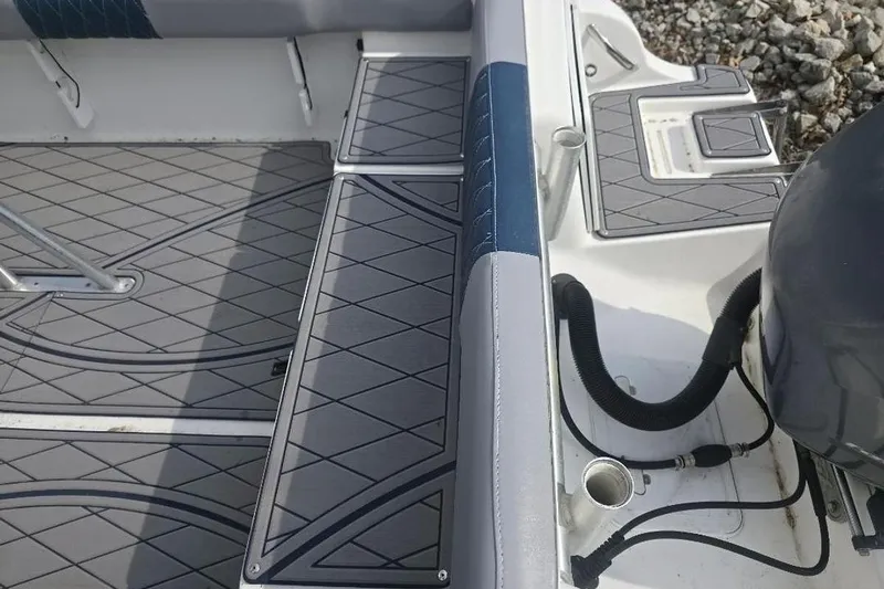 Slide: The Image of 2012 Sea Fox 226 Center Console boat deck with gray non-slip flooring. - 15