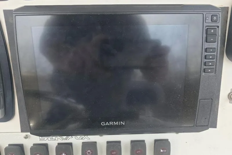Slide: The Image of Garmin display on 2012 Sea Fox 226 Center Console boat dashboard. - 8