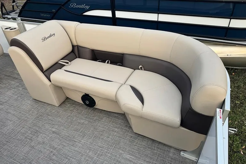 Slide: The Image of 2026 Bentley Pontoons Legacy 223 Swingback with luxurious beige and brown seating. - 12