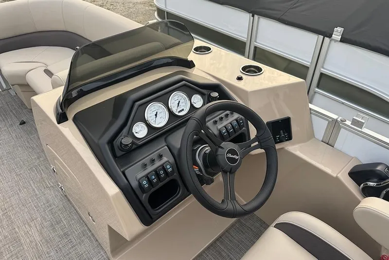 Slide: The Image of 2026 Bentley Pontoons Legacy 223 Swingback dashboard with steering wheel and gauges. - 17