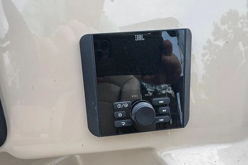 Slide: The Image of JBL audio control panel on 2026 Bentley Pontoons Legacy 223 Swingback. - 18