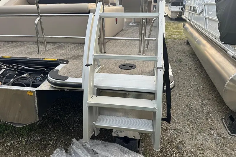 Slide: The Image of 2026 Bentley Pontoons Legacy 223 Swingback with rear entry steps and seating area. - 7