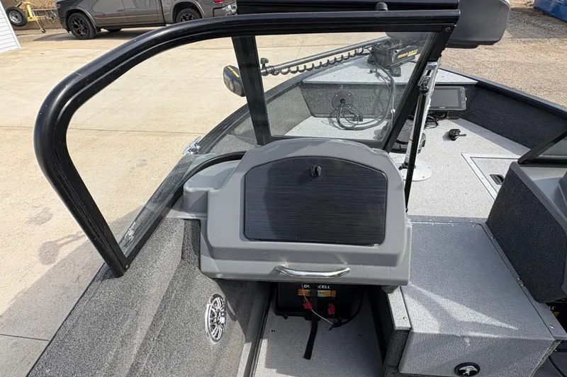 Slide: The Image of 2017 Starcraft Renegade 168 DC boat interior with steering console and windshield. - 16