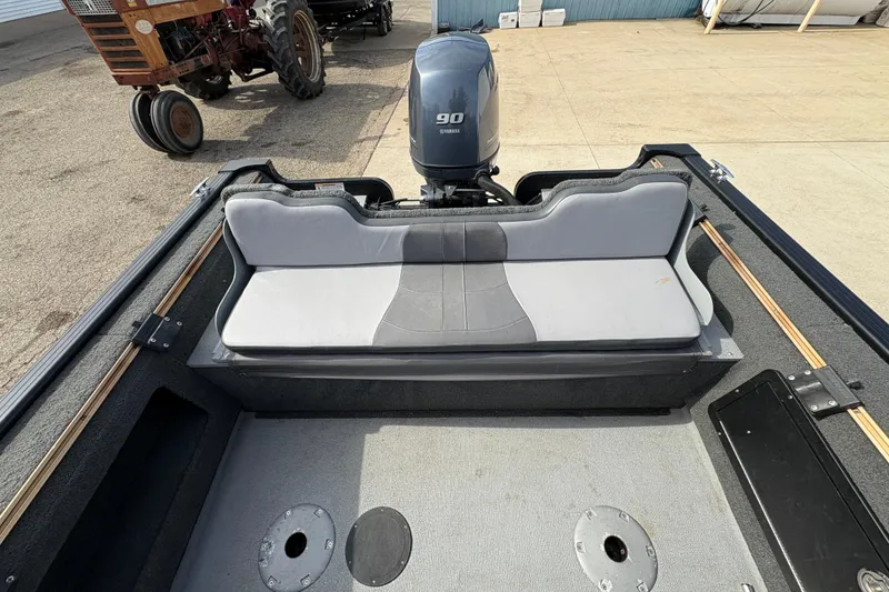 Slide: The Image of 2017 Starcraft Renegade 168 DC boat with Yamaha 90 engine, featuring rear seating. - 25