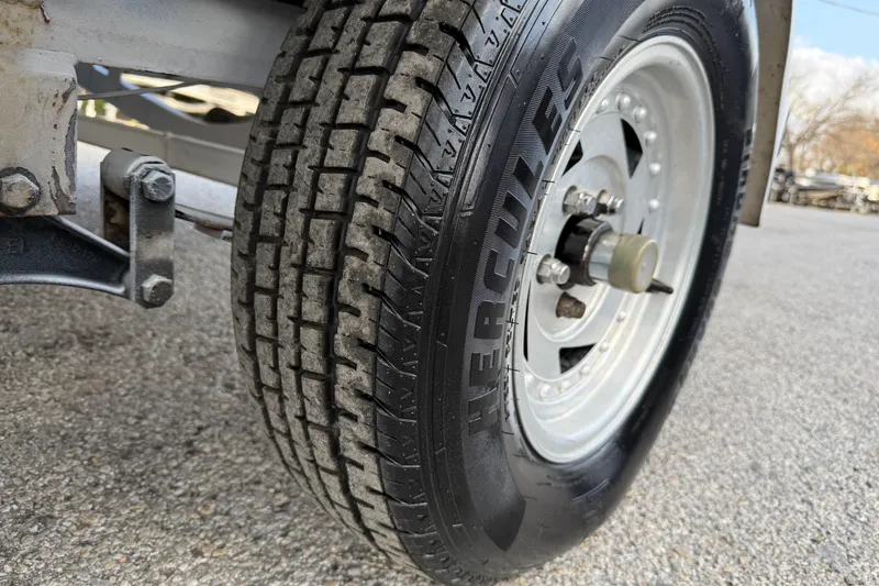 Slide: The Image of Close-up of a Hercules tire on a 1999 Charger 195TF trailer. - 25