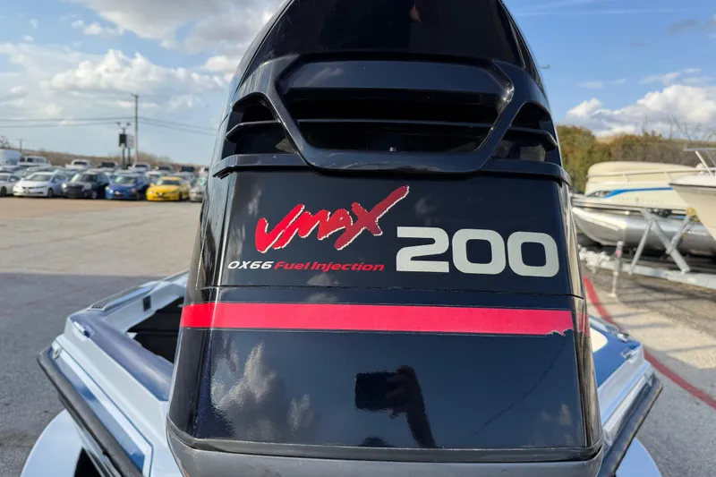 Slide: The Image of Outboard motor with VMax 200 OX66 Fuel Injection branding, Charger 195TF, 1999 model. - 27