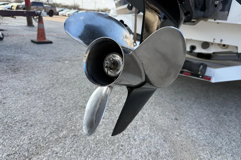 Slide: The Image of Close-up of a 1999 Charger 195TF boat propeller on a trailer. - 28