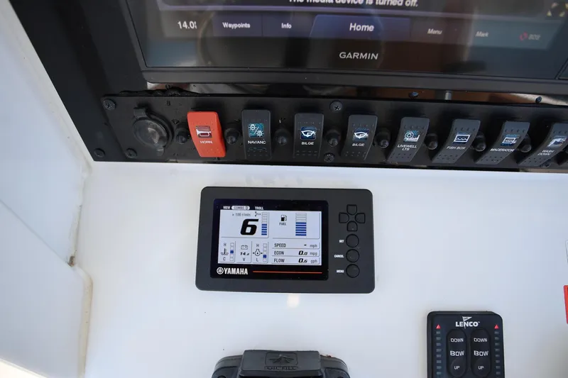 Slide: The Image of Control panel of a 2020 Sea Hunt Ultra 255 SE boat with Yamaha display. - 15