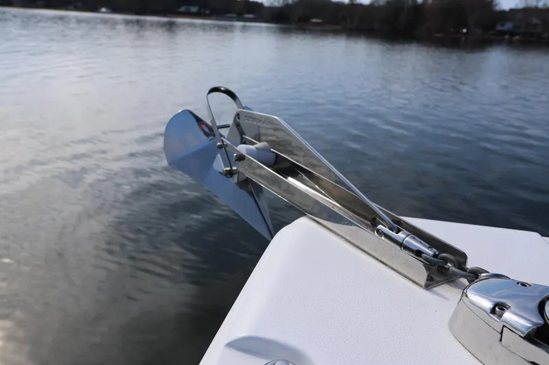 Slide: The Image of Anchor of 2020 Sea Hunt Ultra 255 SE boat on calm water. - 20