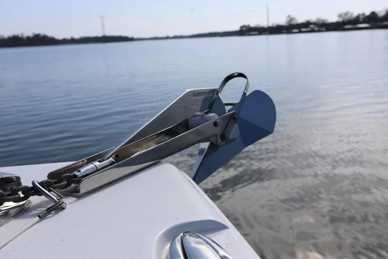 Slide: The Image of Anchor on a 2020 Sea Hunt Ultra 255 SE boat, calm water background. - 21