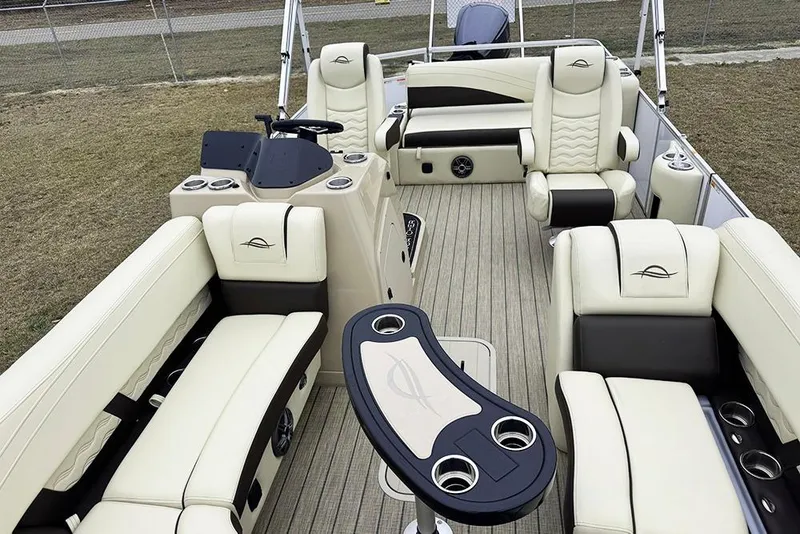 Slide: The Image of Luxurious interior of 2026 SunCatcher Fusion 324SL pontoon boat with plush seating and modern design. - 11