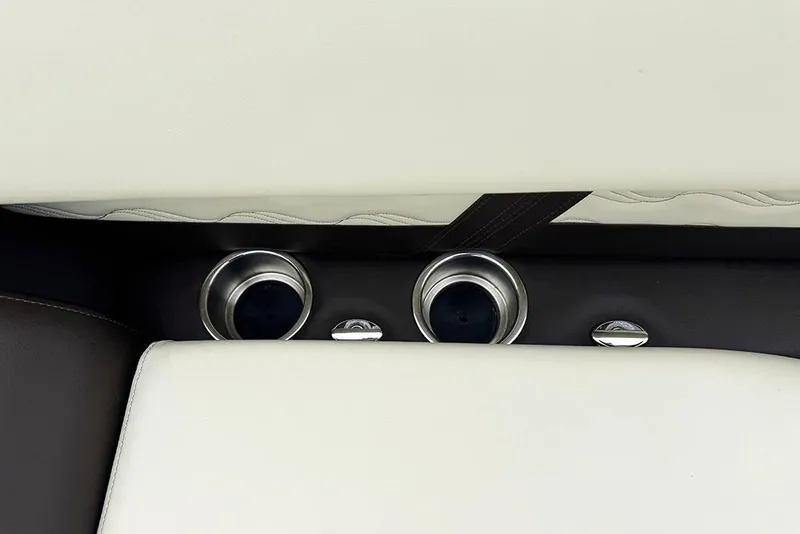Slide: The Image of Cup holders and controls on SunCatcher Fusion 324SL 2026 boat interior. - 15