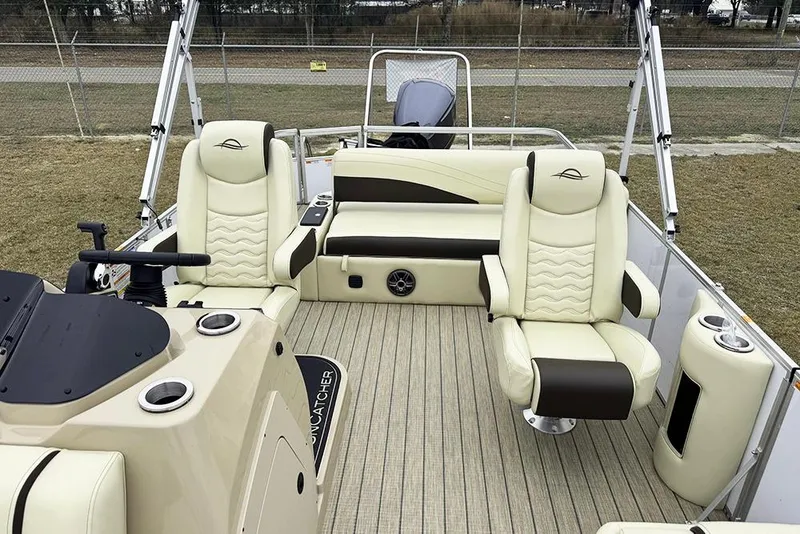 Slide: The Image of Luxurious interior of 2026 SunCatcher Fusion 324SL pontoon boat with plush seating. - 19