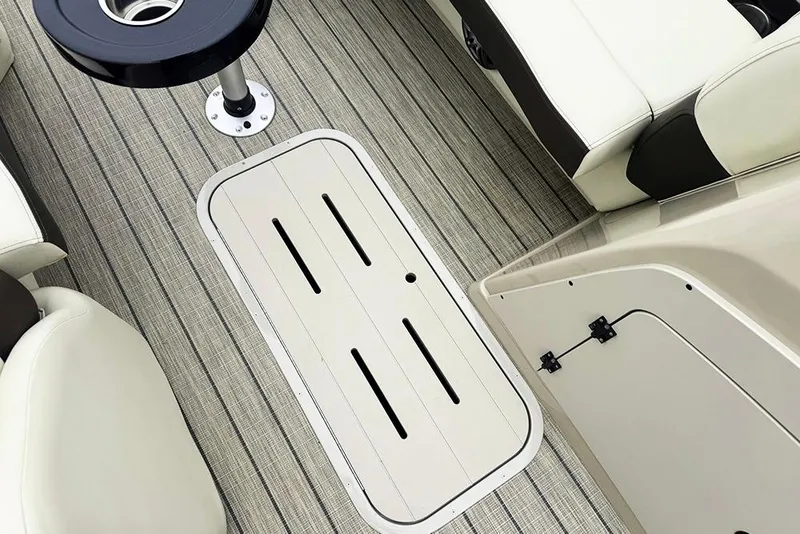Slide: The Image of 2026 SunCatcher Fusion 324SL boat interior with sleek seating and modern flooring design. - 20
