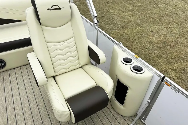 Slide: The Image of Luxurious seating on 2026 SunCatcher Fusion 324SL boat with cup holders and elegant design. - 24