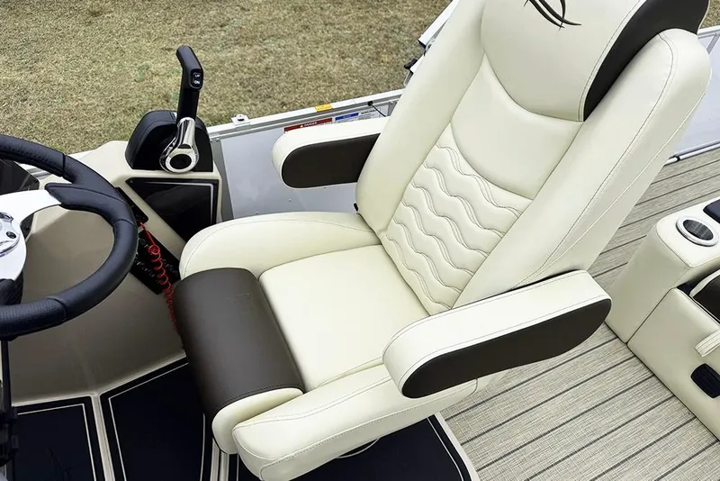 Slide: The Image of Luxurious captain's chair in 2026 SunCatcher Fusion 324SL boat cockpit. - 27