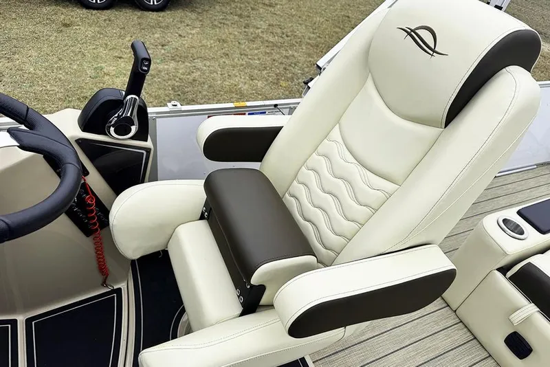 Slide: The Image of Luxurious captain's chair on 2026 SunCatcher Fusion 324SL boat, featuring ergonomic design and premium materials. - 28