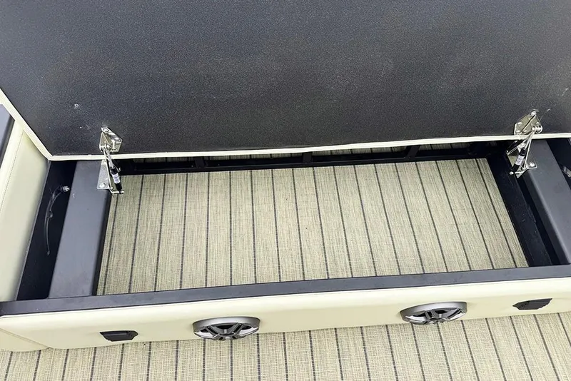 Slide: The Image of Open storage compartment in 2026 SunCatcher Fusion 324SL boat. - 33