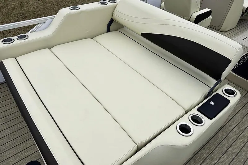 Slide: The Image of Luxurious seating on 2026 SunCatcher Fusion 324SL boat with cup holders and sleek design. - 34
