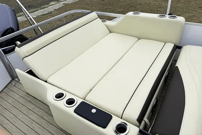 Slide: The Image of Luxurious seating on 2026 SunCatcher Fusion 324SL boat with cup holders and sleek design. - 36