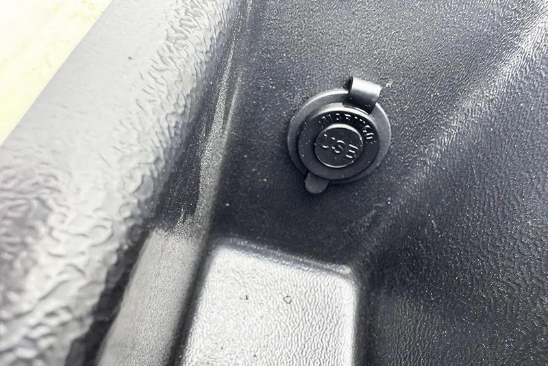 Slide: The Image of Close-up of a 2026 SunCatcher Fusion 324SL power outlet cover. - 38