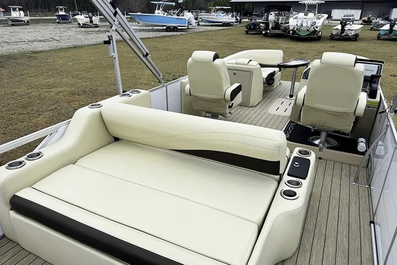 Slide: The Image of Luxurious interior of 2026 SunCatcher Fusion 324SL pontoon boat with plush seating and modern design. - 39