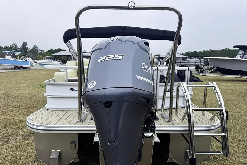 Slide: The Image of 2026 SunCatcher Fusion 324SL pontoon boat with powerful 225 engine, rear view. - 4