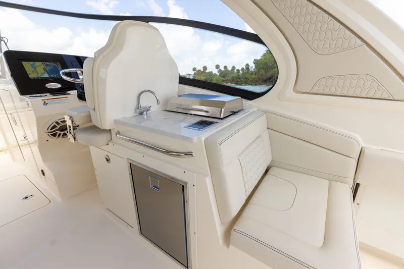 Slide: The Image of The image shows the cockpit of a 2027 Scout 288 Dorado with sleek white interior. - 3