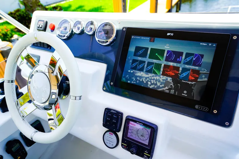 Slide: The Image of Control panel of 2017 Azimut 42 Fly yacht with touchscreen and steering wheel. - 20