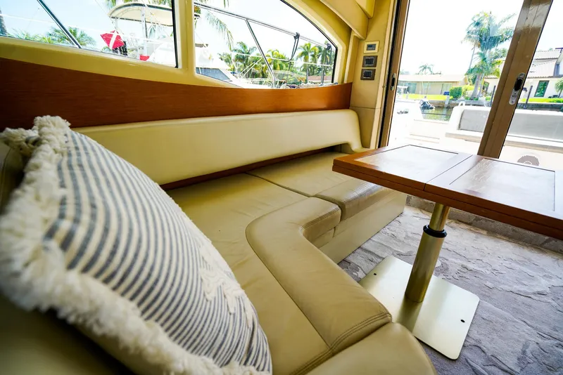 Slide: The Image of Luxurious interior of 2017 Azimut 42 Fly yacht with plush seating and elegant table. - 30