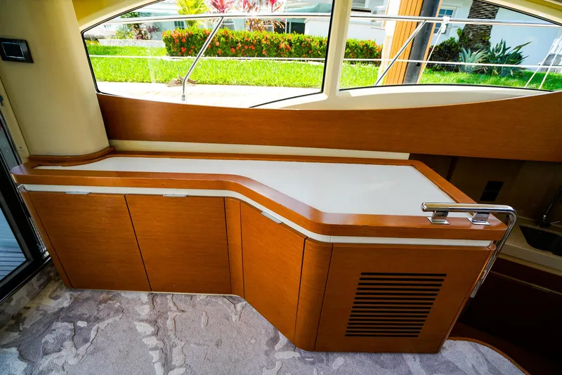 Slide: The Image of Luxurious interior of 2017 Azimut 42 Fly yacht with elegant wood cabinetry. - 33