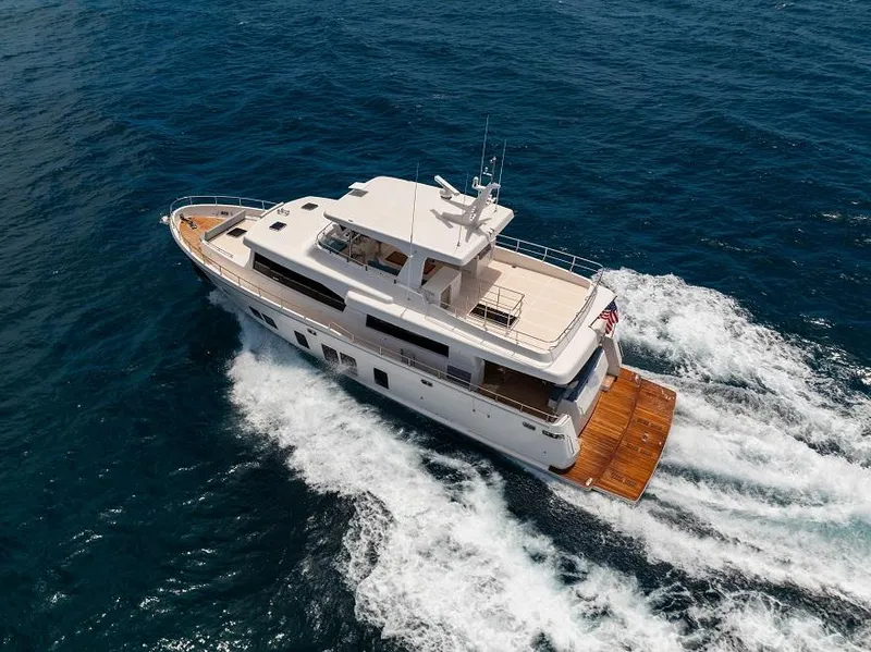 Slide: The Image of 2026 Offshore Yachts CE Series cruising on open sea, showcasing luxury and performance. - 27