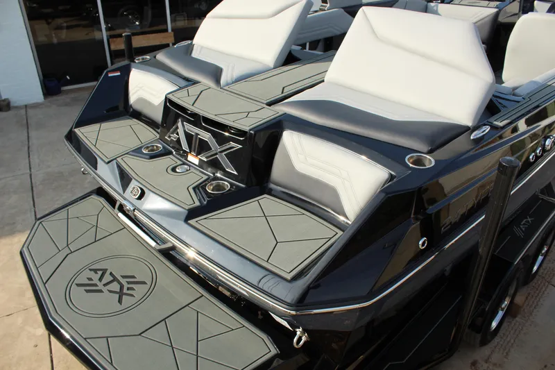 Slide: The Image of 2026 ATX Surf Boats 24 Type-S with sleek seating and modern design. - 11