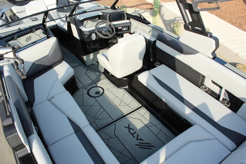 Slide: The Image of 2026 ATX Surf Boats 24 Type-S interior with modern seating and sleek design. - 12