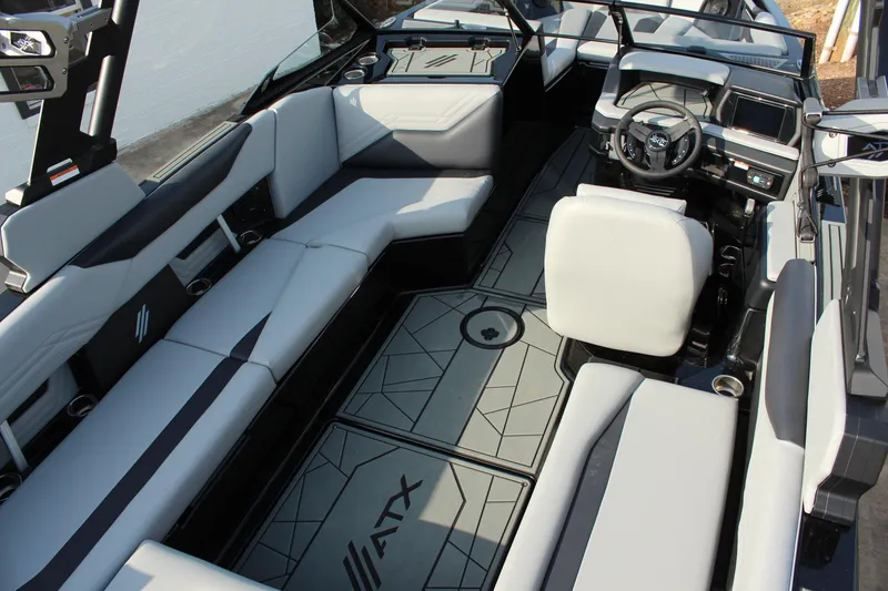 Slide: The Image of 2026 ATX Surf Boats 24 Type-S interior with sleek seating and modern dashboard design. - 13
