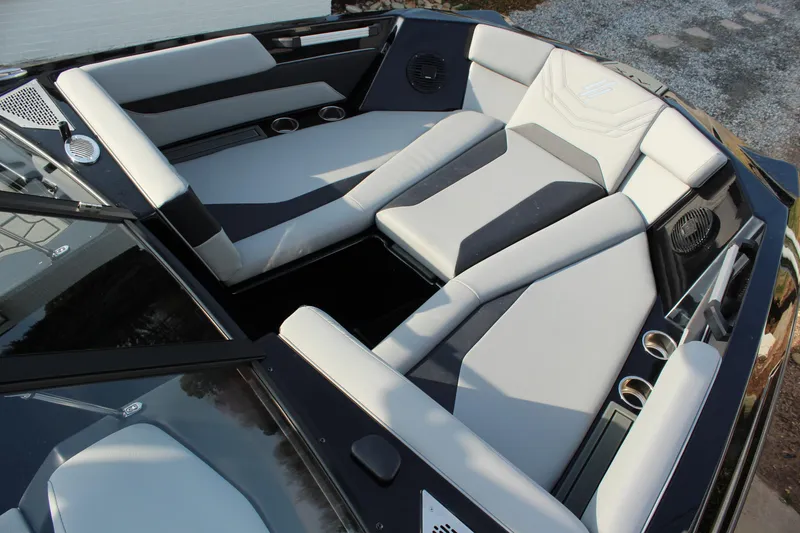 Slide: The Image of Luxurious interior of 2026 ATX Surf Boats 24 Type-S with sleek seating and cup holders. - 17