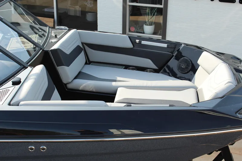Slide: The Image of 2026 ATX Surf Boats 24 Type-S interior with sleek, modern seating design. - 19