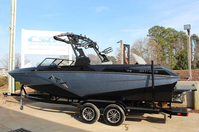 Slide: The Image of 2026 ATX Surf Boats 24 Type-S on trailer at Charlotte Ski Boats dealership. - 7