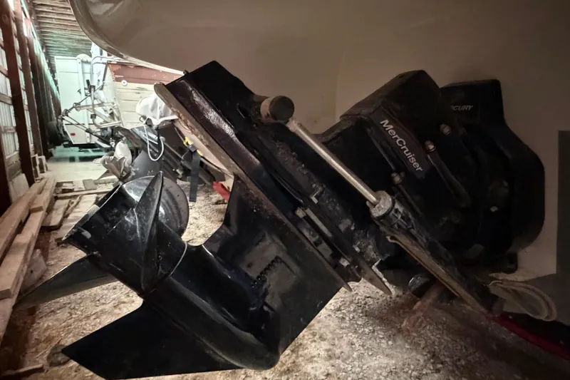 Slide: The Image of 2019 Stingray 208 LS boat with MerCruiser engine in storage. - 12