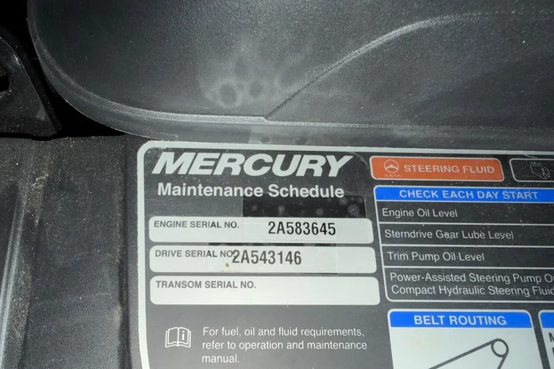 Slide: The Image of 2019 Stingray 208 LS Mercury maintenance schedule label with serial numbers and fluid check instructions. - 20