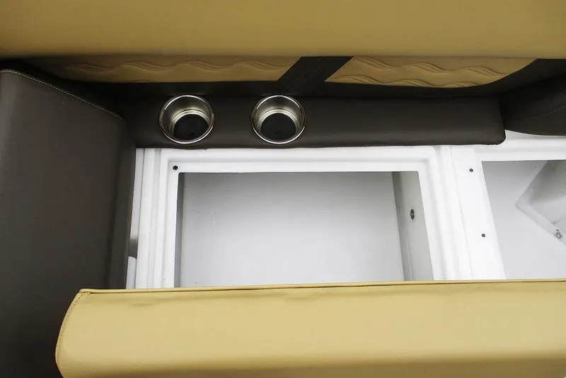 Slide: The Image of Interior of 2026 SunCatcher Fusion 322RC boat with cup holders and storage compartments. - 14