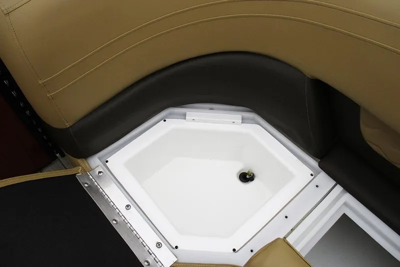Slide: The Image of Interior seating and storage of 2026 SunCatcher Fusion 322RC boat, featuring tan and black upholstery. - 18