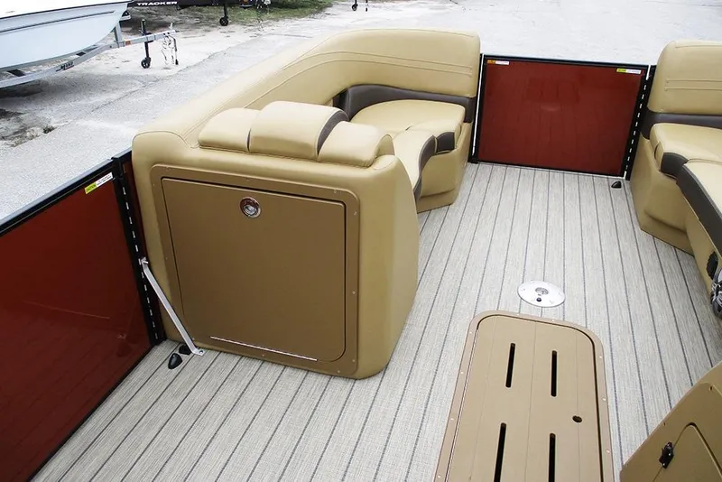 Slide: The Image of Luxurious interior of 2026 SunCatcher Fusion 322RC pontoon boat with beige seating. - 19