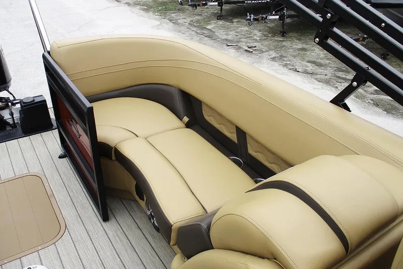 Slide: The Image of Luxurious seating on 2026 SunCatcher Fusion 322RC boat, featuring beige upholstery and sleek design. - 24