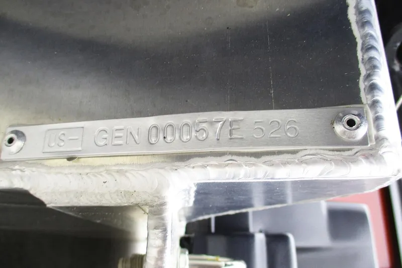 Slide: The Image of Metallic identification plate on SunCatcher Fusion 322RC, 2026 model, with serial number. - 30