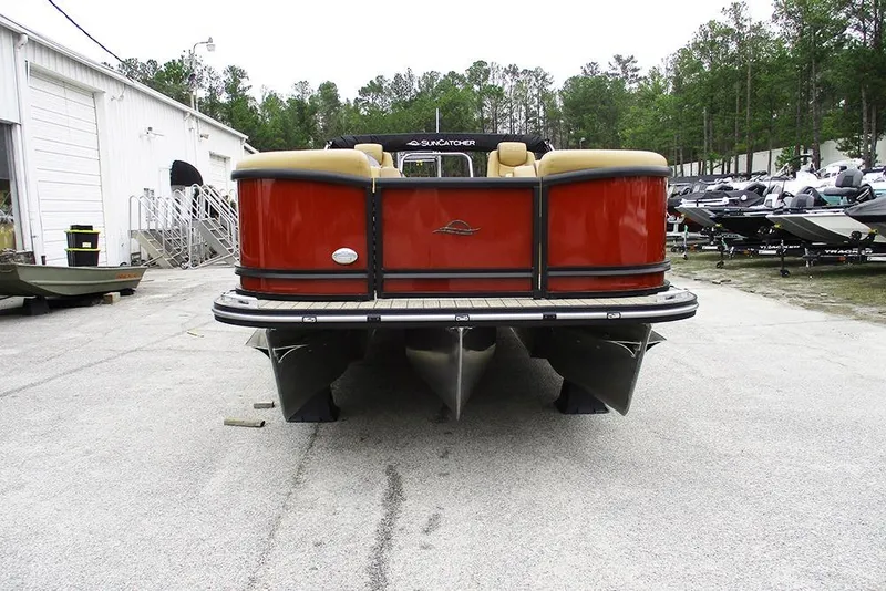 Slide: The Image of 2026 SunCatcher Fusion 322RC pontoon boat in a marina setting. - 4